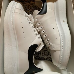 worn once Alexander McQueens White smooth shiny classic leather lace up sneaker